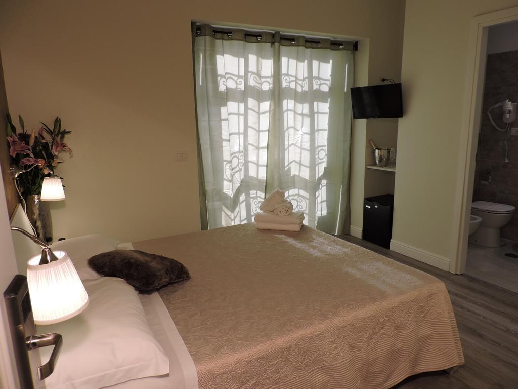 Anfiteatro Suite Rome Bagian luar foto