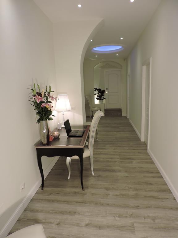 Anfiteatro Suite Rome Bagian luar foto